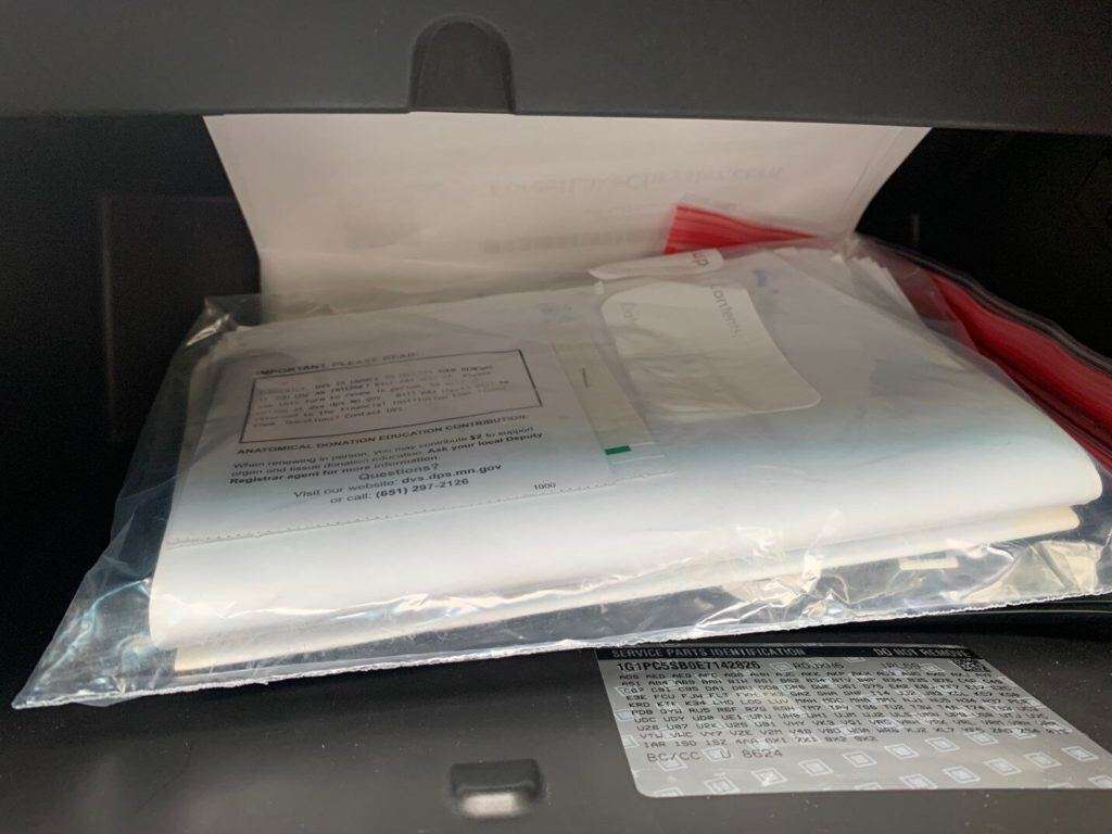 Glove Compartment of used vehicle screenshot by White Oak Security, a treasure trove of sensitive personal information.