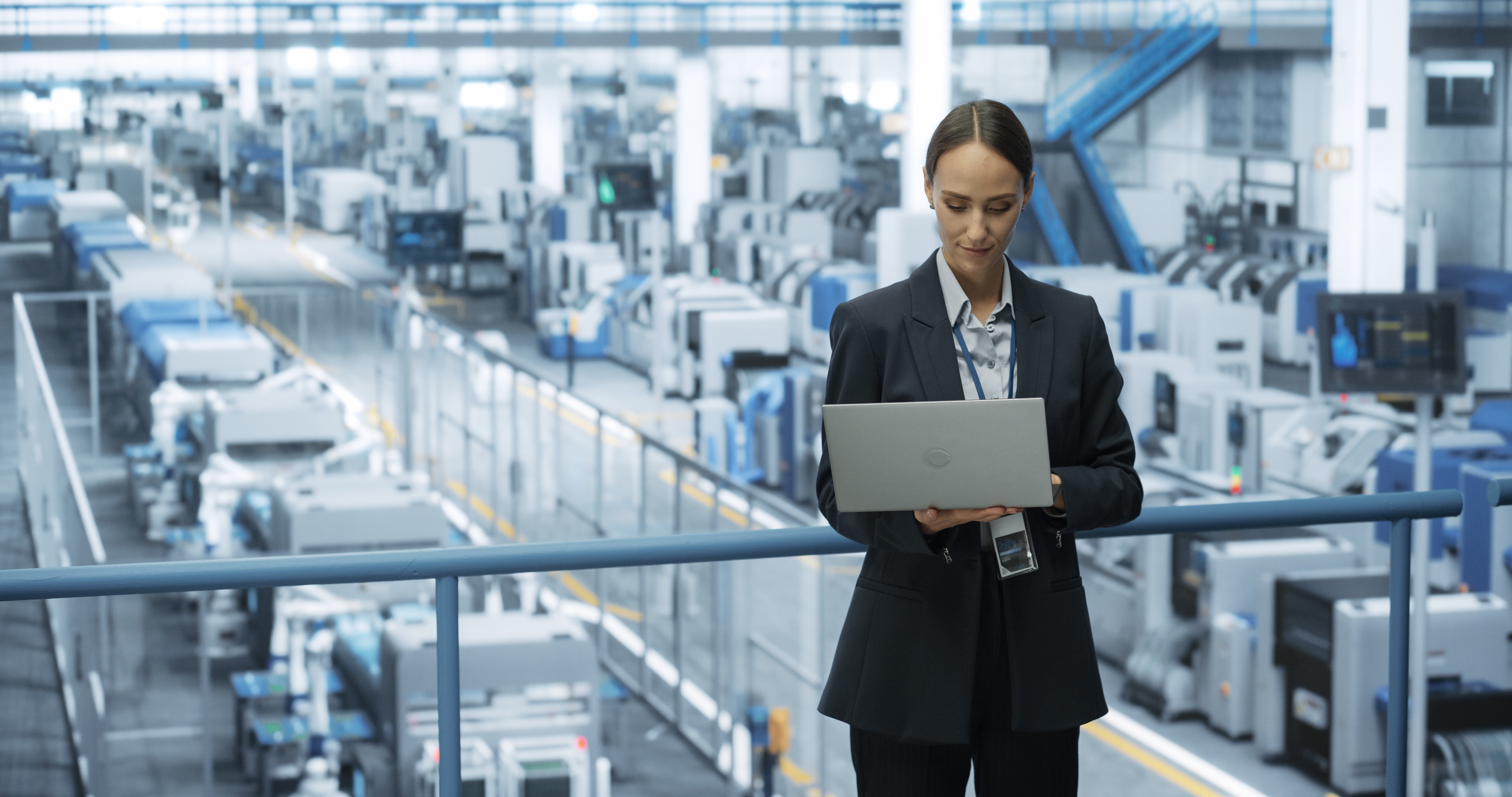 Image of a woman performing ethical hack on manufacturing facility